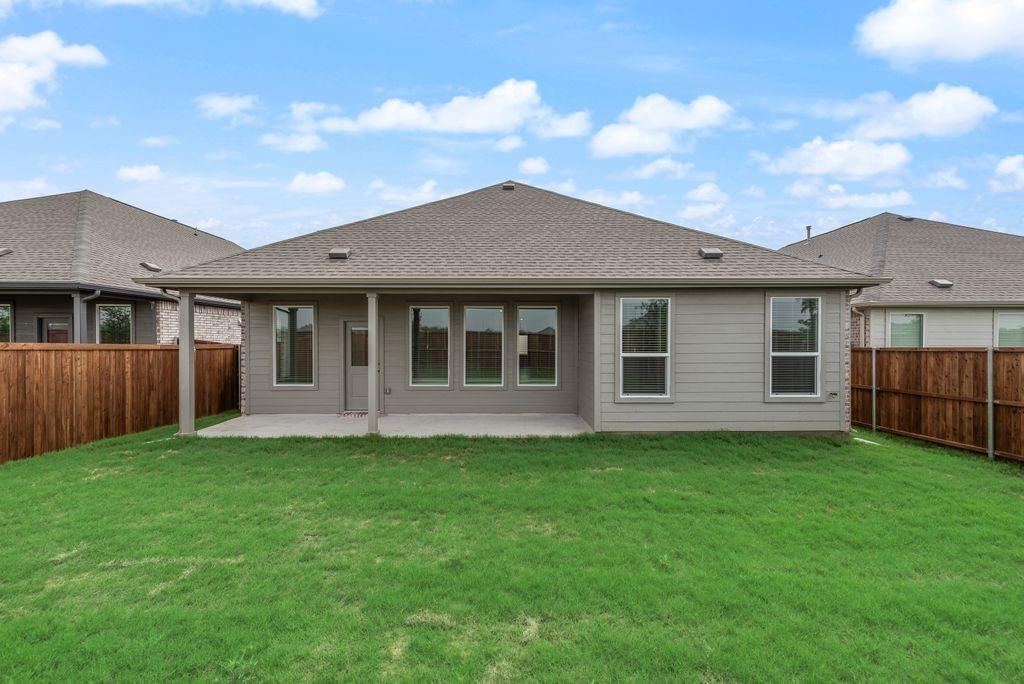 3009 Dutch Road Providence Village, TX 76227 - Photo 18 of 19 a front view of a house with a garden