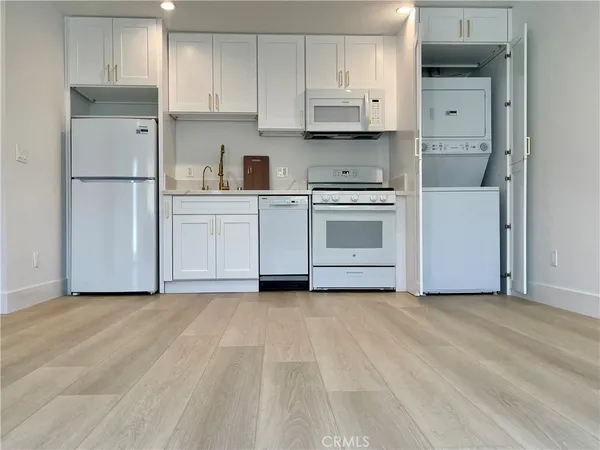 a view of a room with shelf on the wall