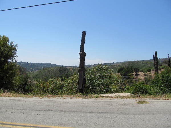 999 Coyote Road Santa Barbara, CA 93108 - Photo 5 of 12 a front view of a house with a yard and garage