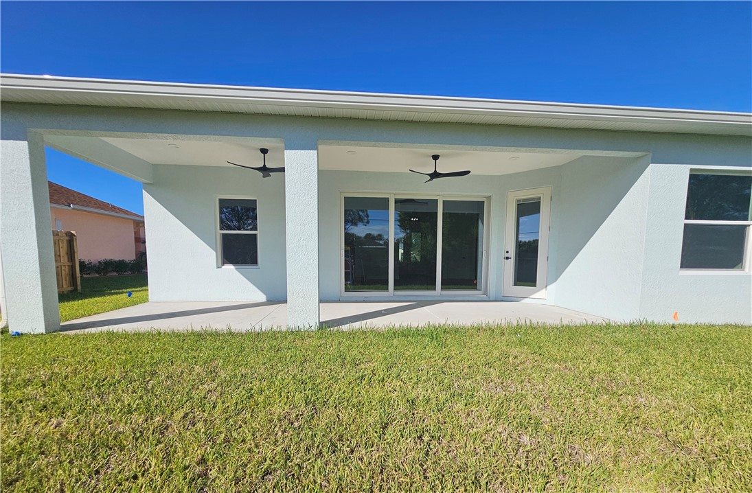 961 George Street Sebastian, FL 32958 - Photo 2 of 18 a view of a house with a swimming pool
