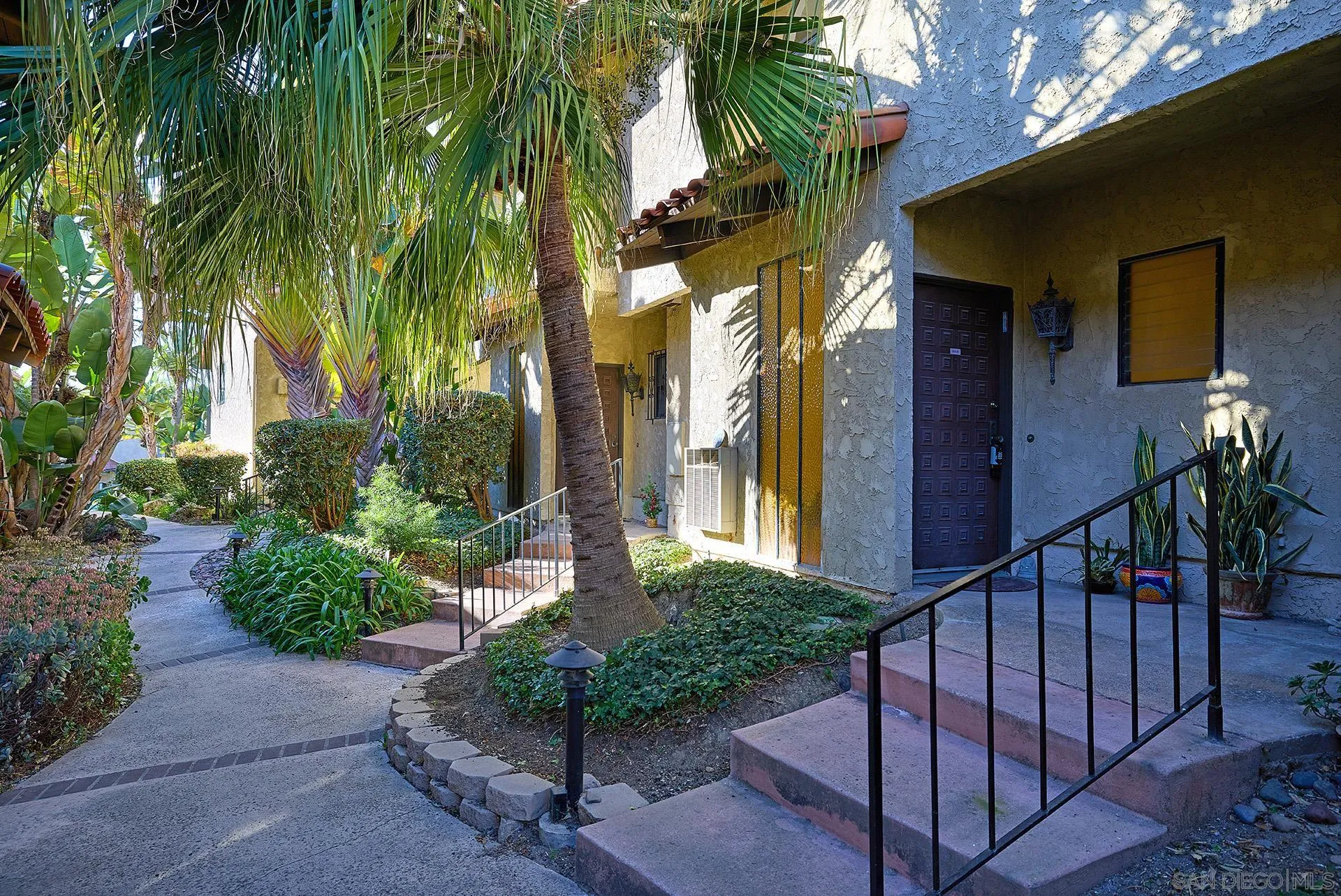 a view of a house with a street