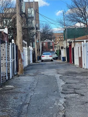 a view of a street with cars