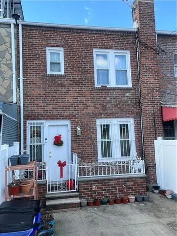 a front view of a house with a garage