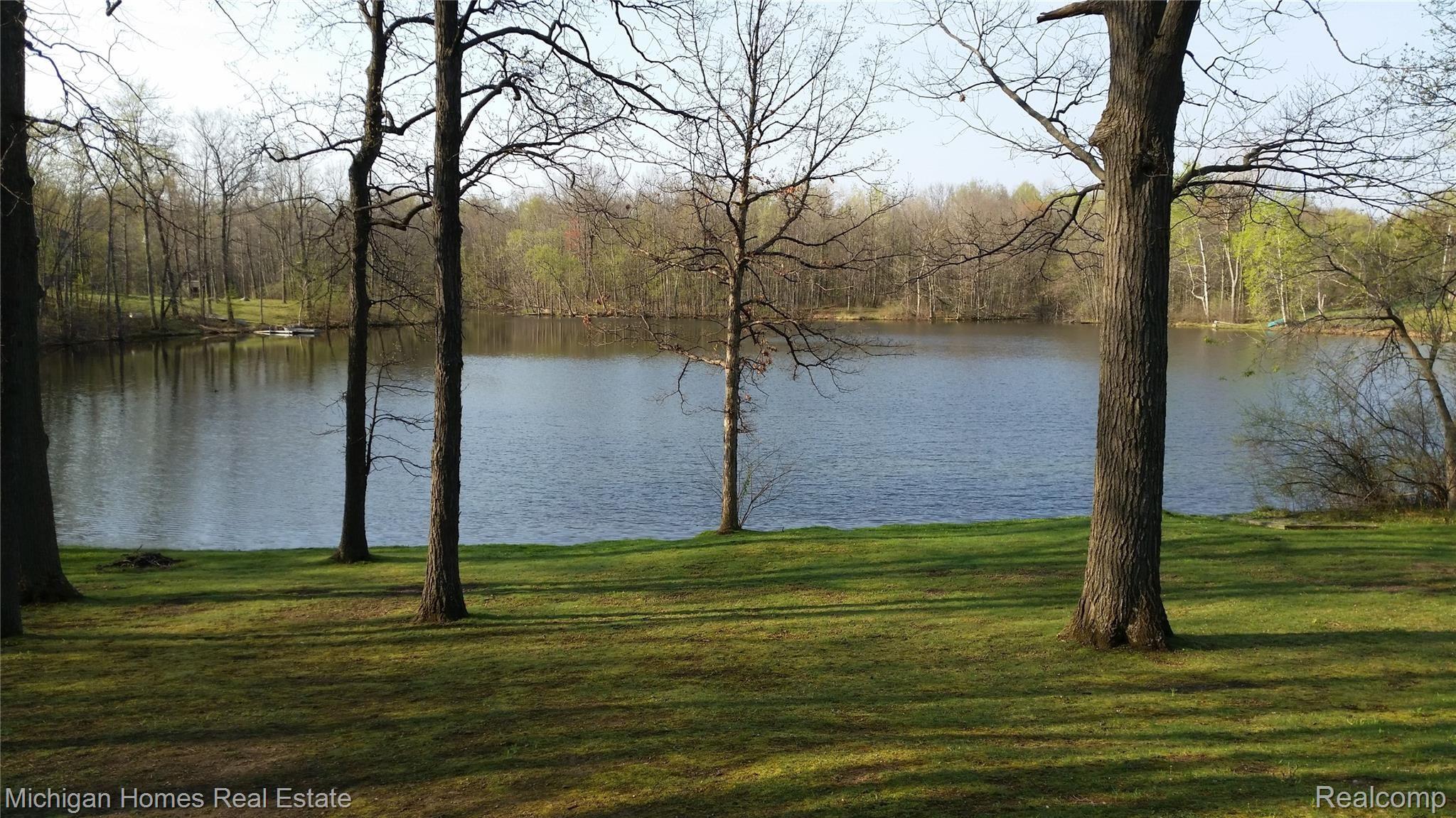 16281 Worden Road Holly, MI 48442 - Photo 10 of 37 Spring looking from yard to Pier Lake
