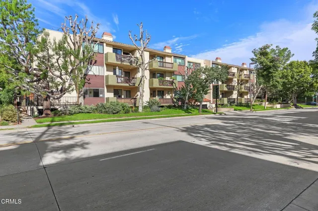 a view of a building with a street