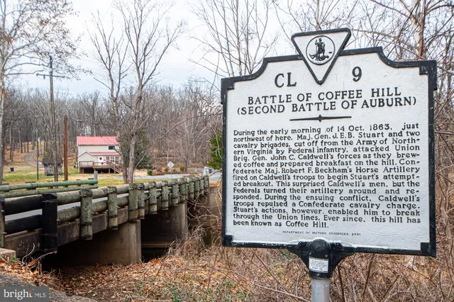 a sign on the side of a road