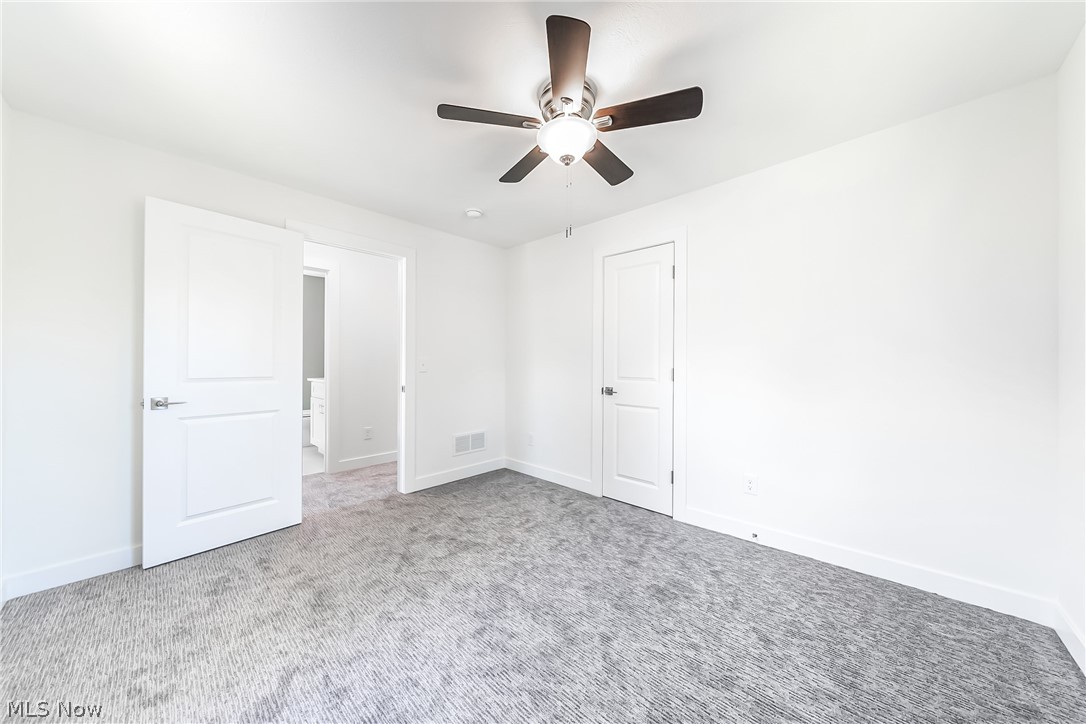 3959 Ardmore Road Cleveland Heights, OH 44121 - Photo 23 of 38 Unfurnished bedroom featuring ceiling fan and carpet flooring