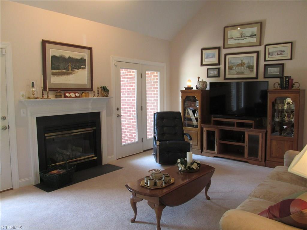 200 Navajo Road Lexington, NC 27295 - Photo 3 of 29 Spacious Living room with fireplace and two exterior doors to outside patio