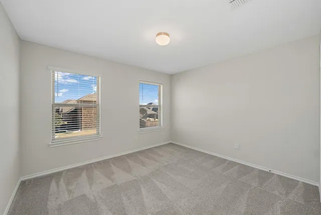 a bathroom with a bathtub a shower a toilet and a sink