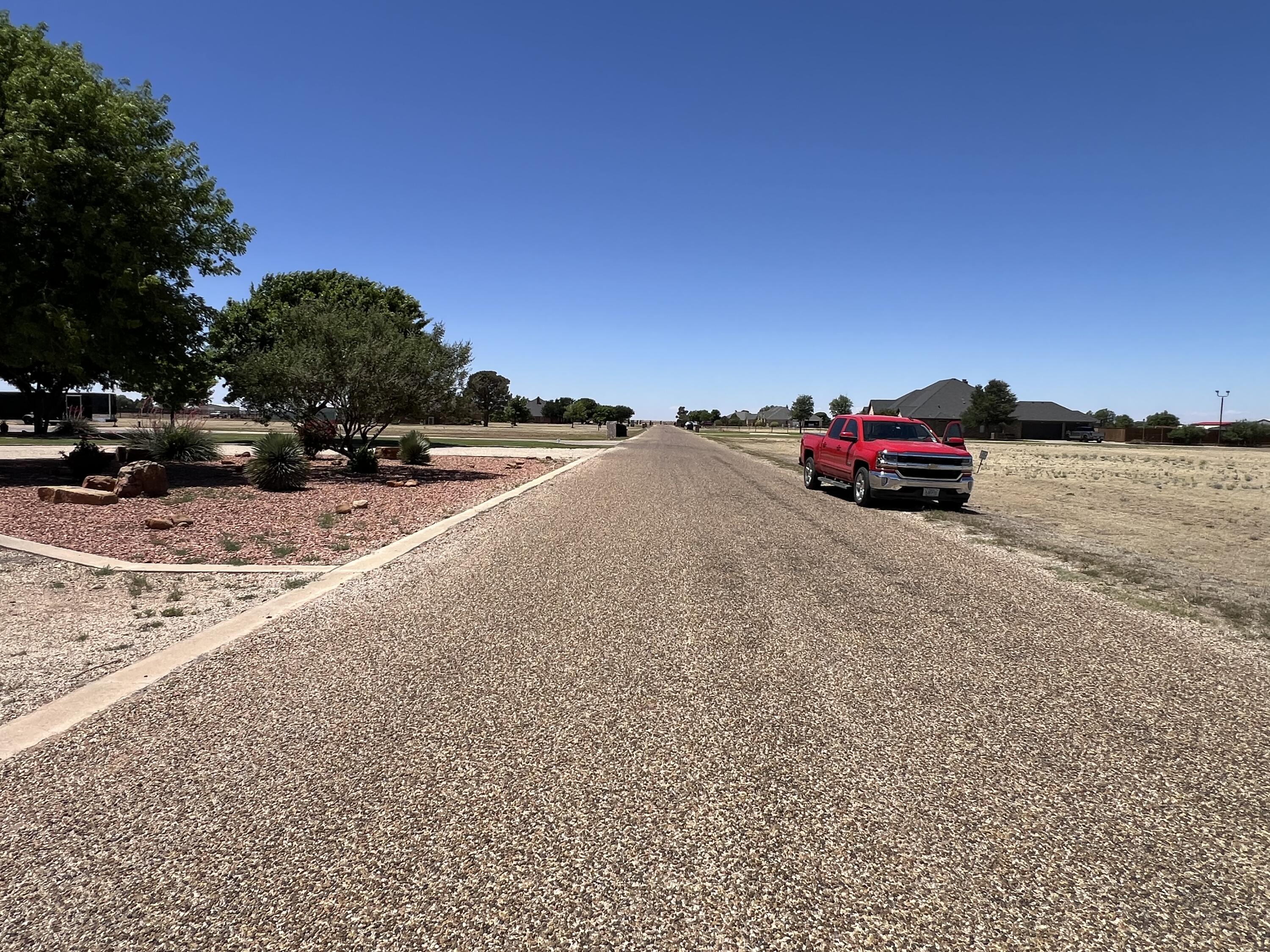 5402 C R 7920 Lubbock, TX 79424 - Photo 7 of 7 a view of car parked on the side of the road