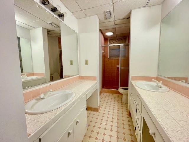 2396 Lavista Road Northeast Atlanta, GA 30329 - Photo 25 of 28 a bathroom with a sink a vanity and a mirror