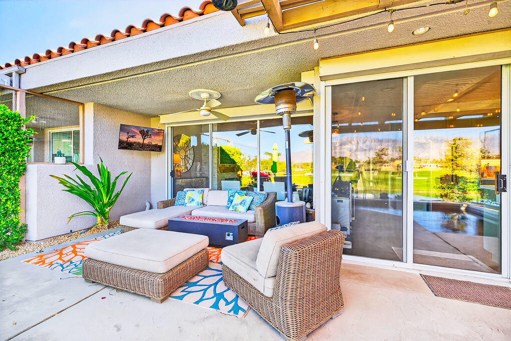 10 Colonial Drive Rancho Mirage, CA 92270 - Photo 3 of 25 a outdoor living space with furniture and garden view