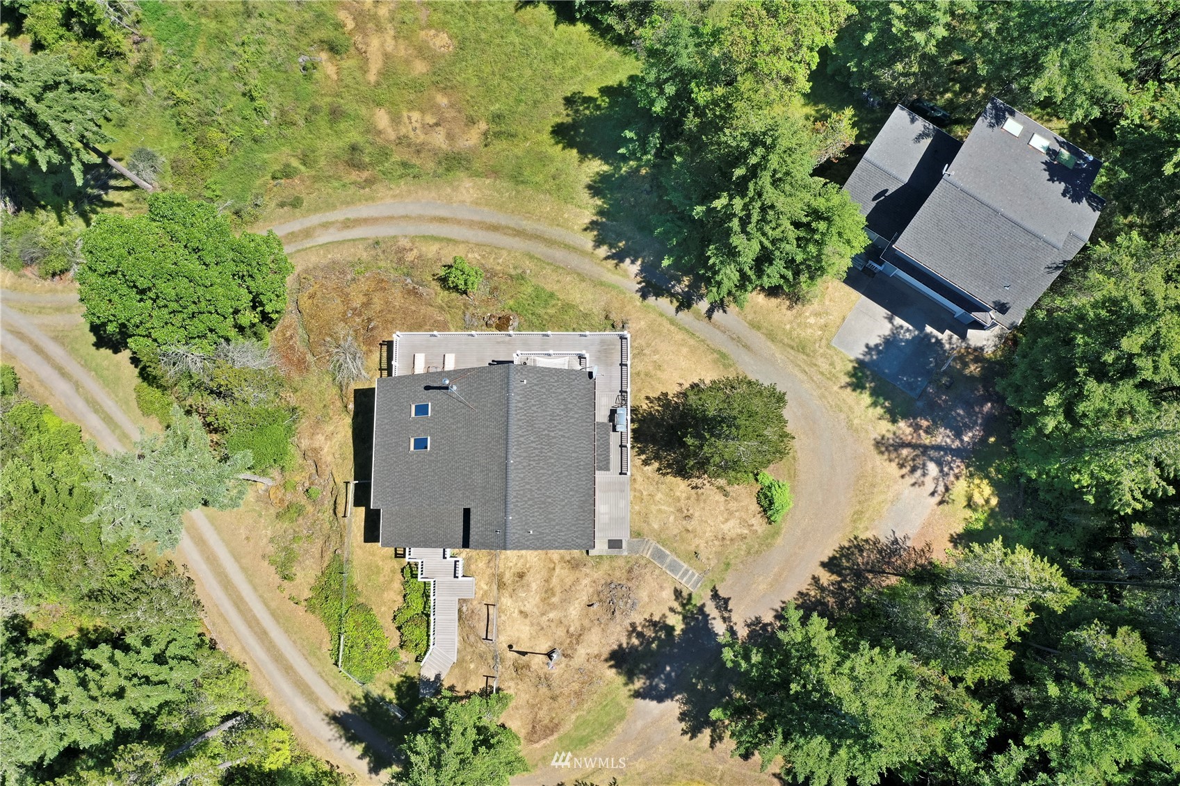 338 Sunrise Ridge Road San Juan Island, WA 98250 - Photo 12 of 39 an aerial view of a house with a yard