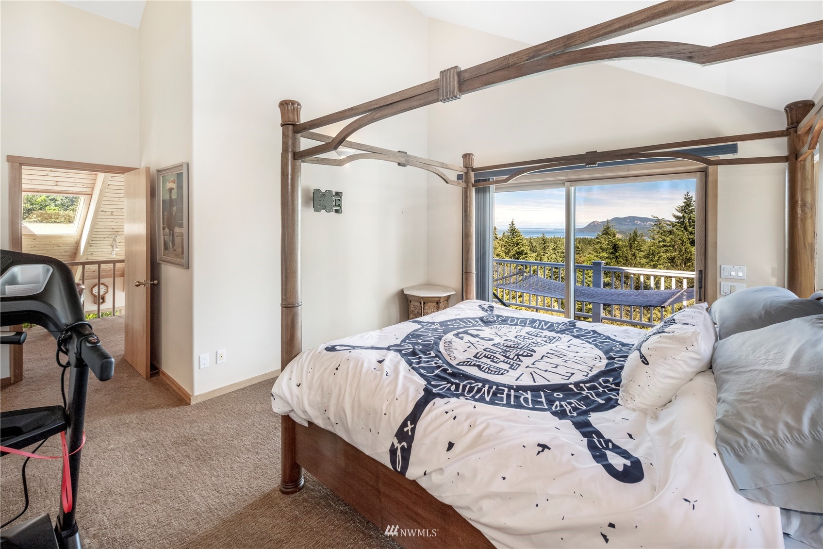 338 Sunrise Ridge Road San Juan Island, WA 98250 - Photo 15 of 39 a bedroom with a bed and a window