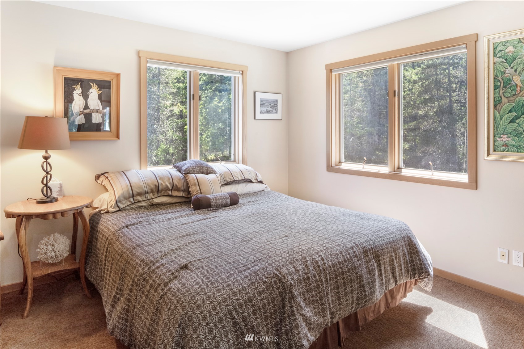 338 Sunrise Ridge Road San Juan Island, WA 98250 - Photo 18 of 39 a bedroom with a bed and a window