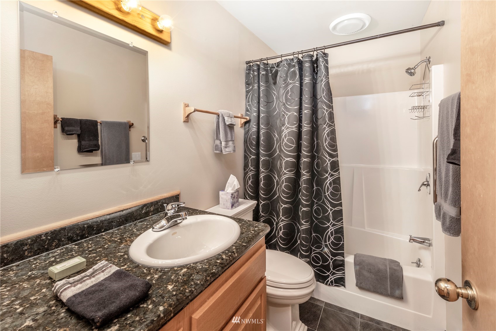 338 Sunrise Ridge Road San Juan Island, WA 98250 - Photo 19 of 39 a bathroom with a sink toilet and shower