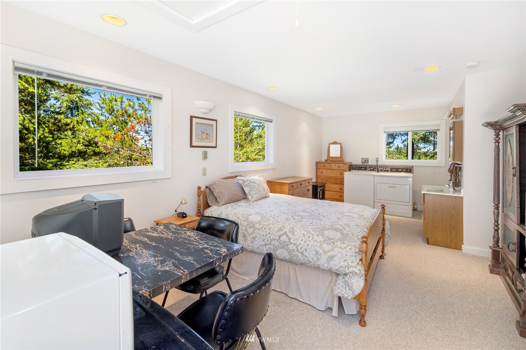 338 Sunrise Ridge Road San Juan Island, WA 98250 - Photo 28 of 39 a living room with furniture and a large window