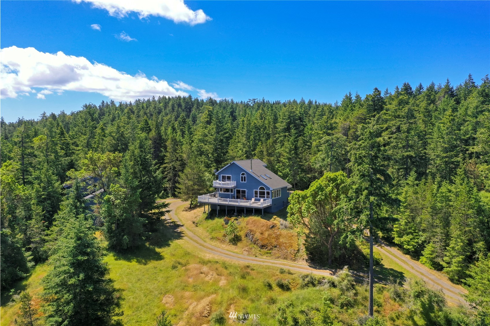 338 Sunrise Ridge Road San Juan Island, WA 98250 - Photo 31 of 39 a view of a house with a big yard