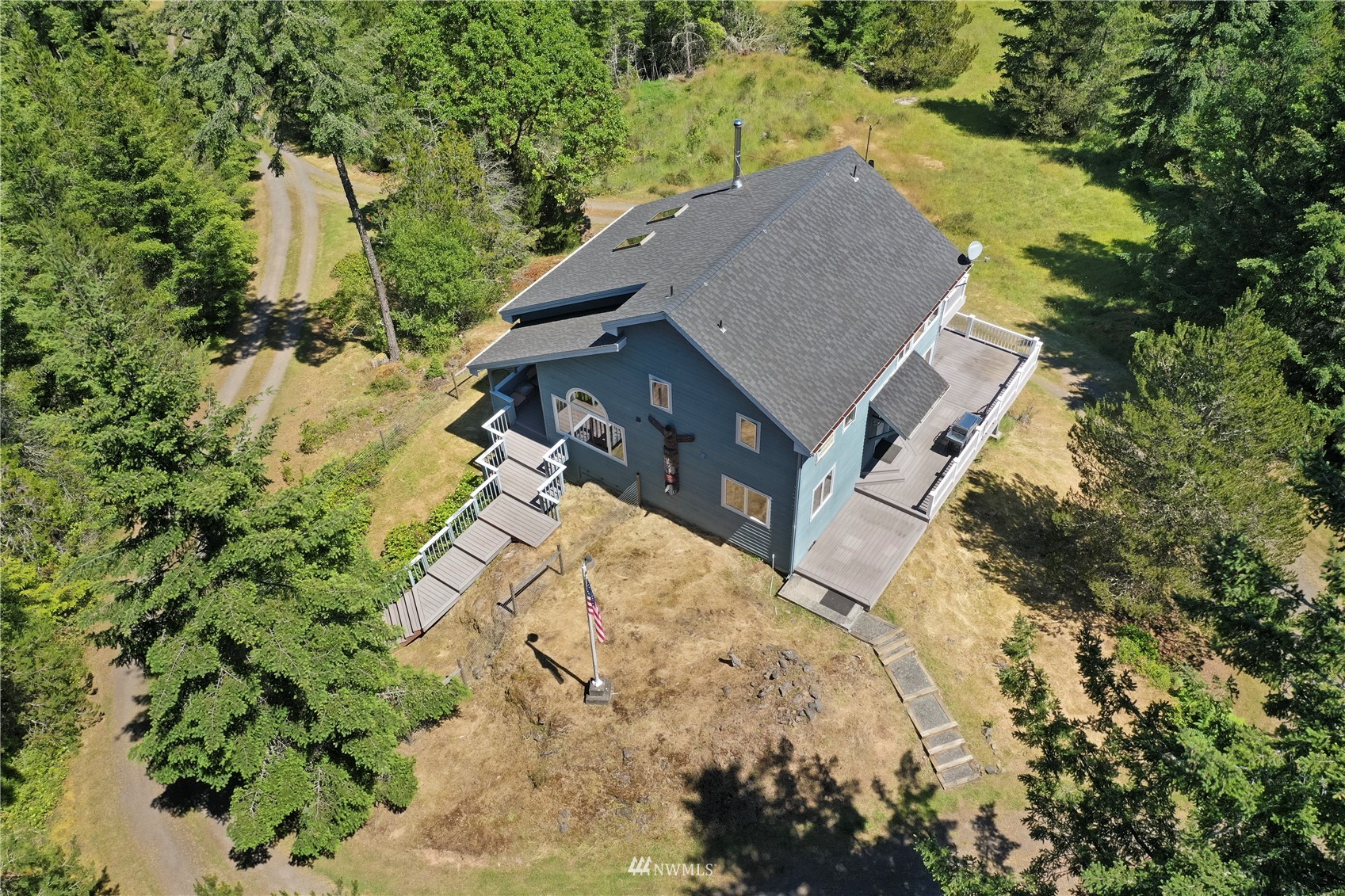 338 Sunrise Ridge Road San Juan Island, WA 98250 - Photo 35 of 39 an aerial view of a house with a yard
