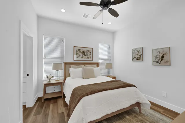 a view of a bathroom with tub shower