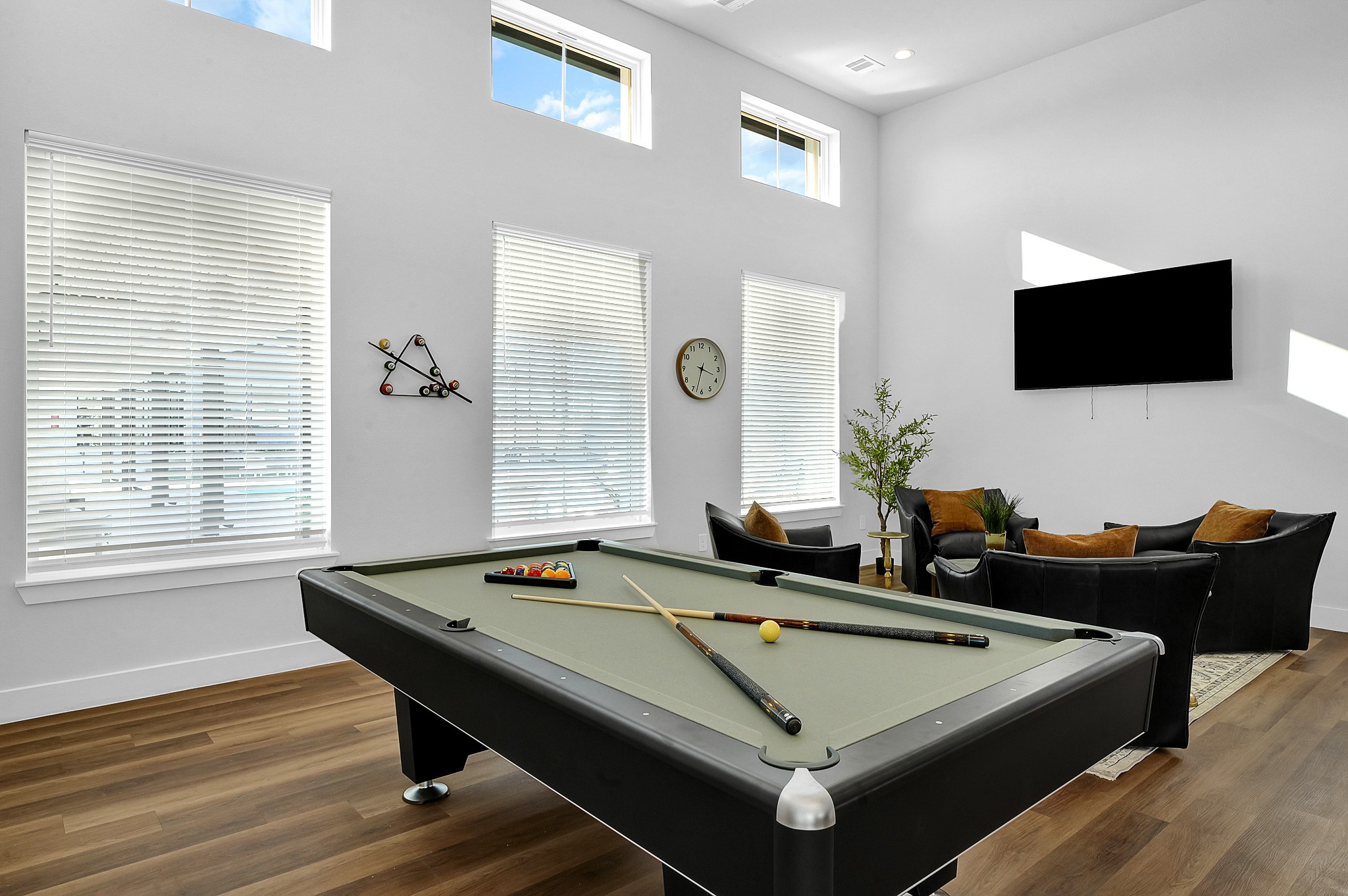 38634 Spur 149 Road, Unit 44A Magnolia, TX 77354 - Photo 39 of 48 a room with furniture pool table flat screen tv and windows