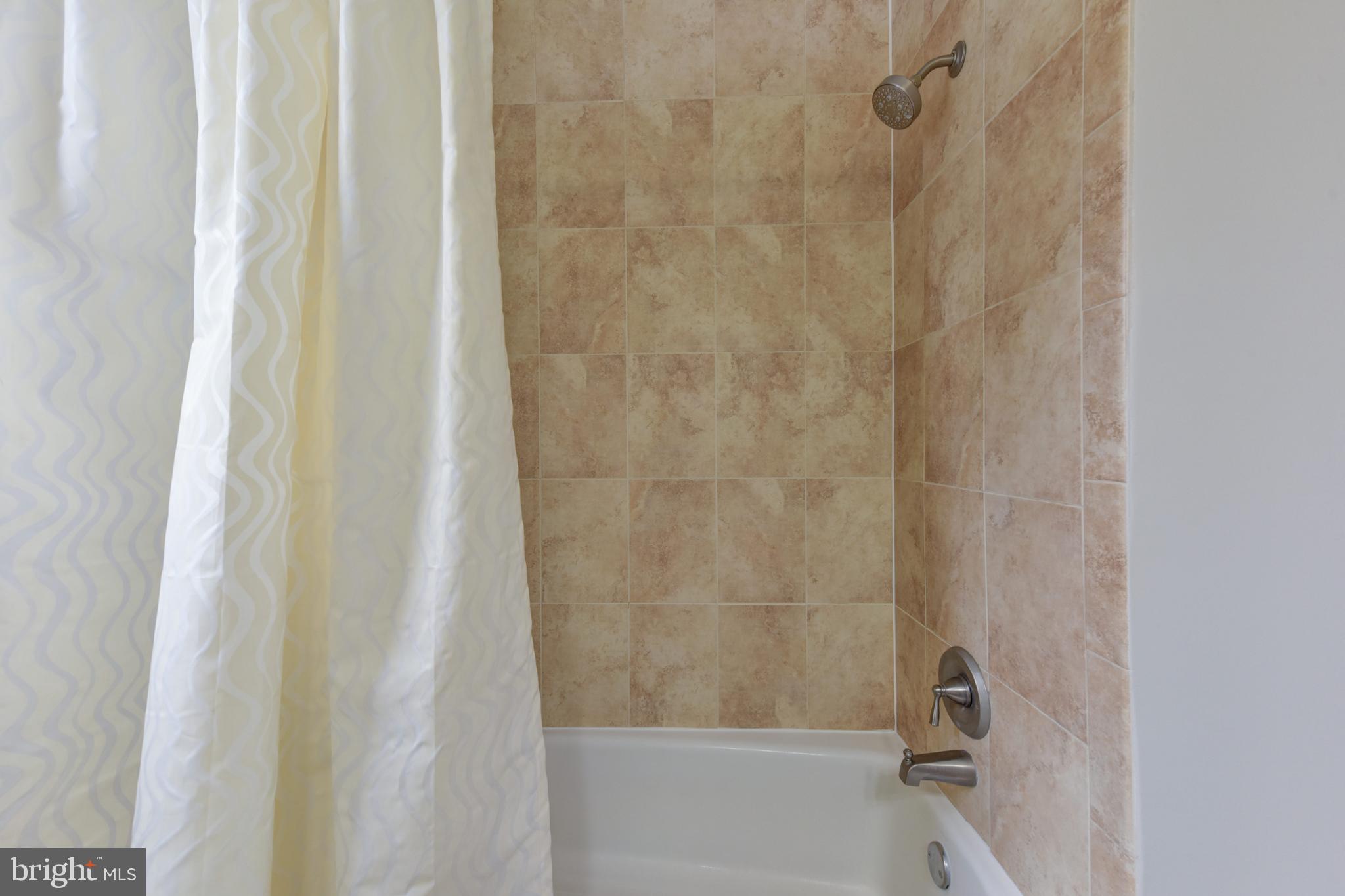 7309 Dunston Street Springfield, VA 22151 - Photo 20 of 37 Beautiful tile & new hardware