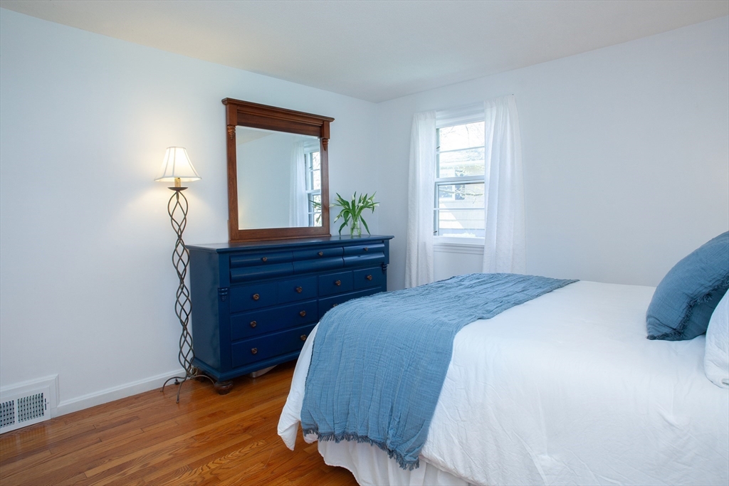 31 East Allen Ridge Road Springfield, MA 01118 - Photo 27 of 34 a bedroom with a bed and a dresser