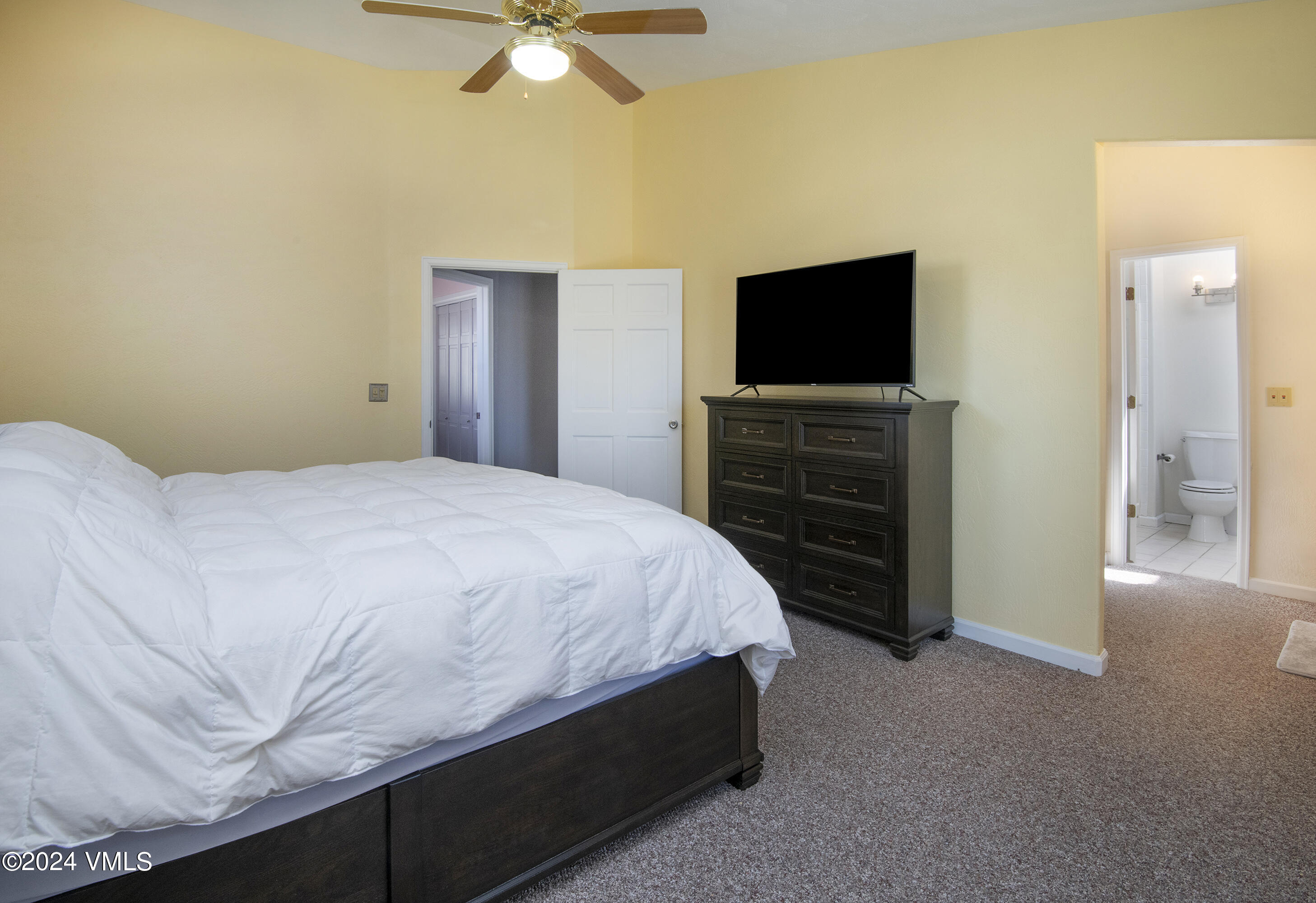 6 Ringneck Eagle, CO 81631 - Photo 23 of 59 a bedroom with a bed and a flat screen tv