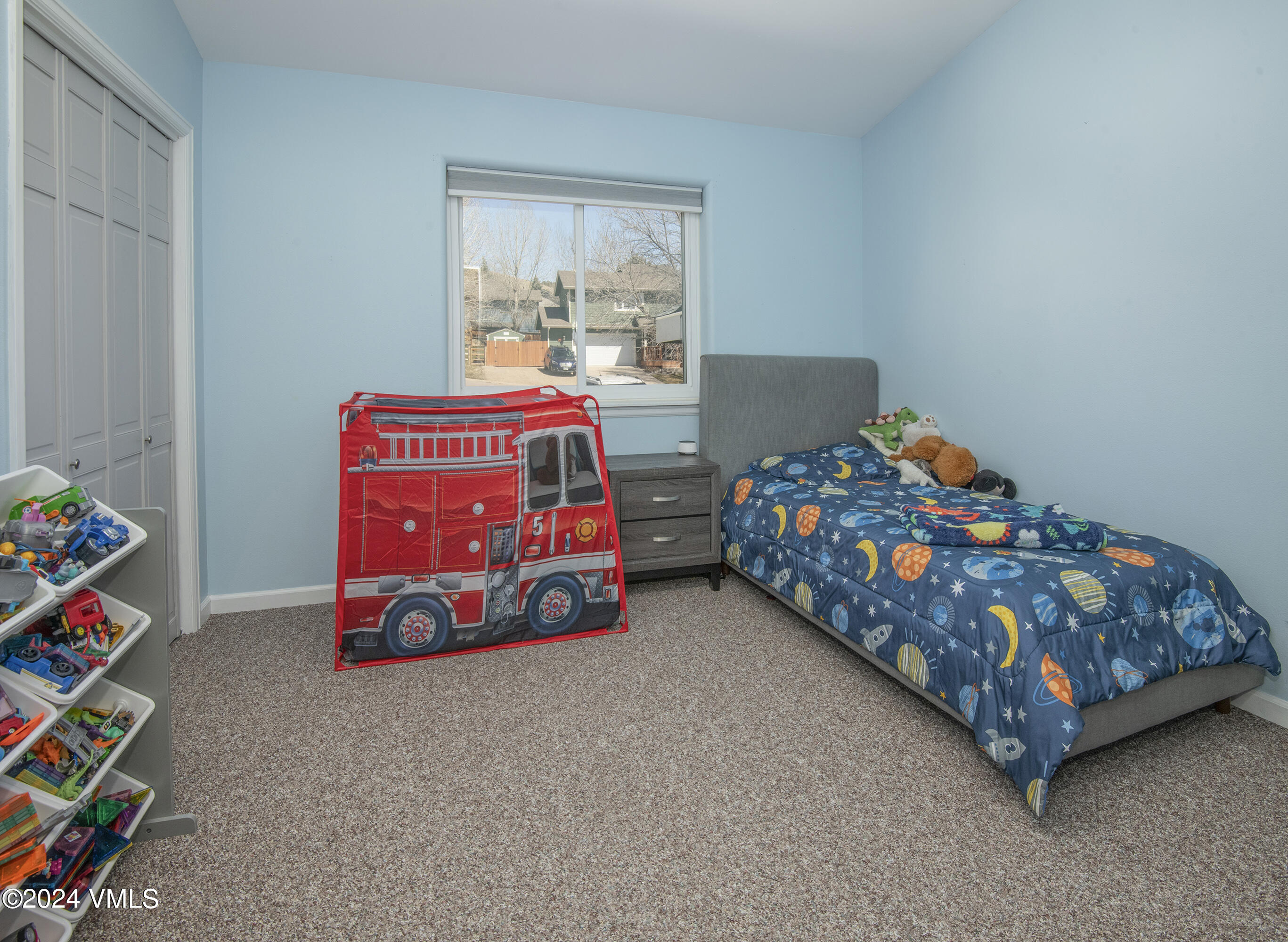 6 Ringneck Eagle, CO 81631 - Photo 28 of 59 a bedroom with bed and a baby crib