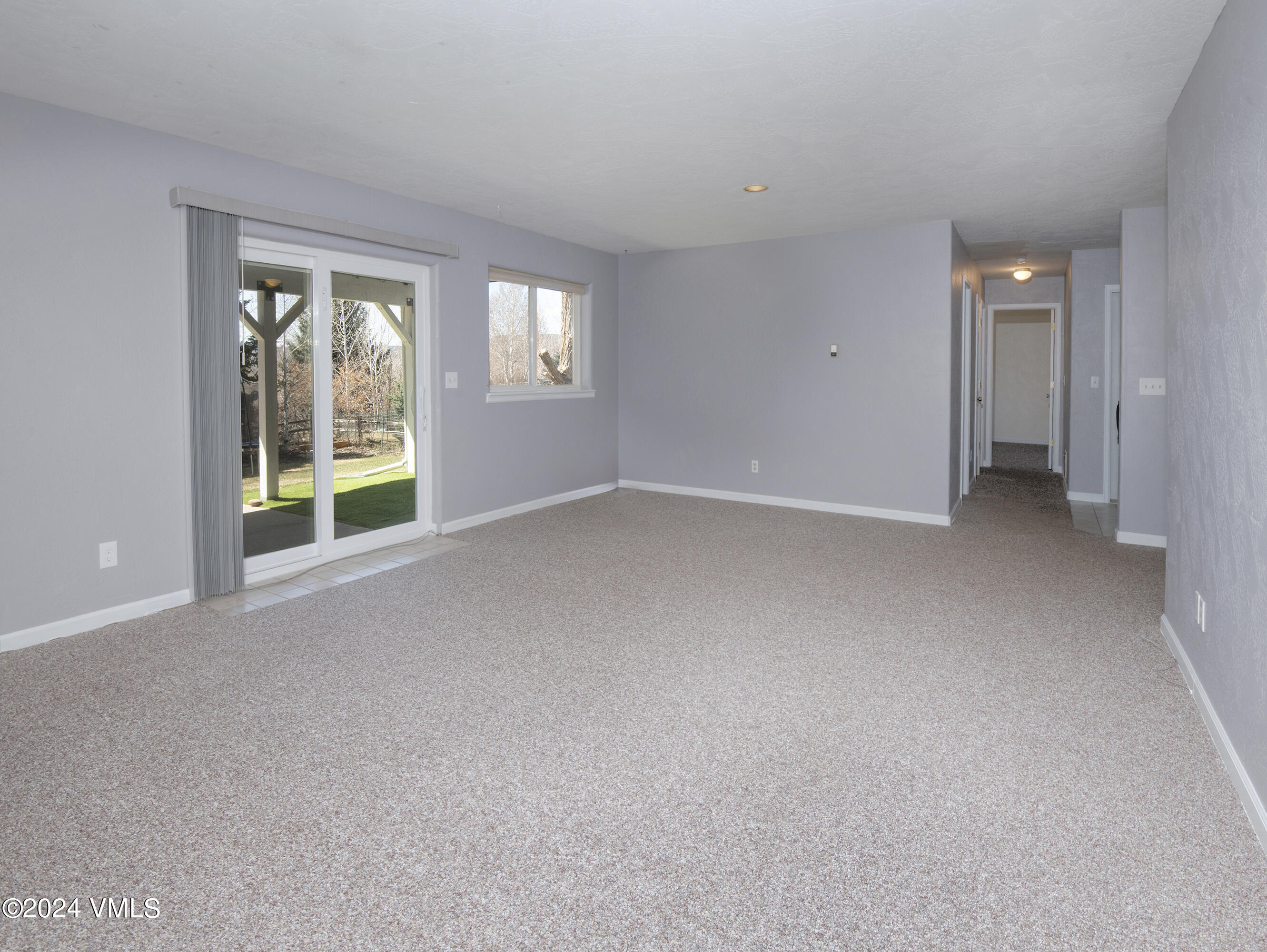 6 Ringneck Eagle, CO 81631 - Photo 32 of 59 a view of a big room with windows and chandelier fan