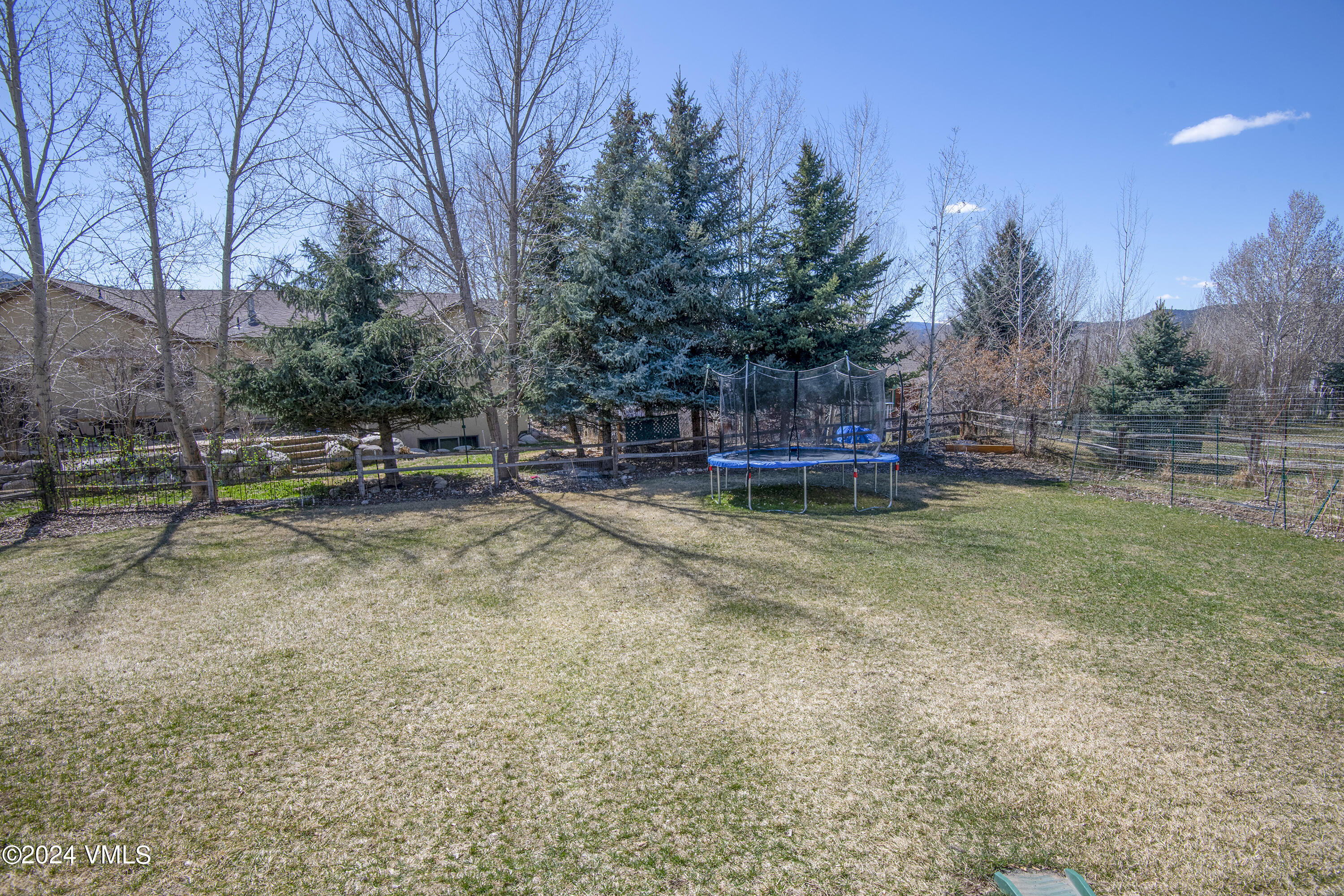 6 Ringneck Eagle, CO 81631 - Photo 54 of 59 a view of a yard with chairs