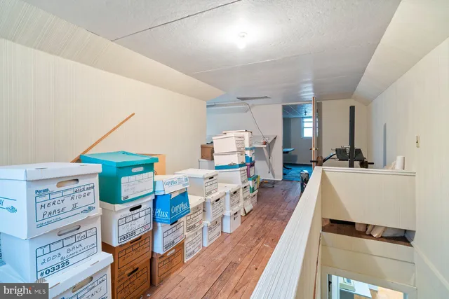 a room with furniture and a wooden floor