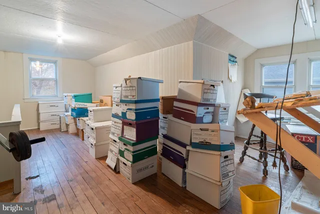 a view of a workspace with furniture