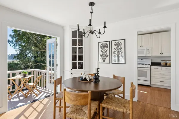 a view of a dining room with furniture window and outside view