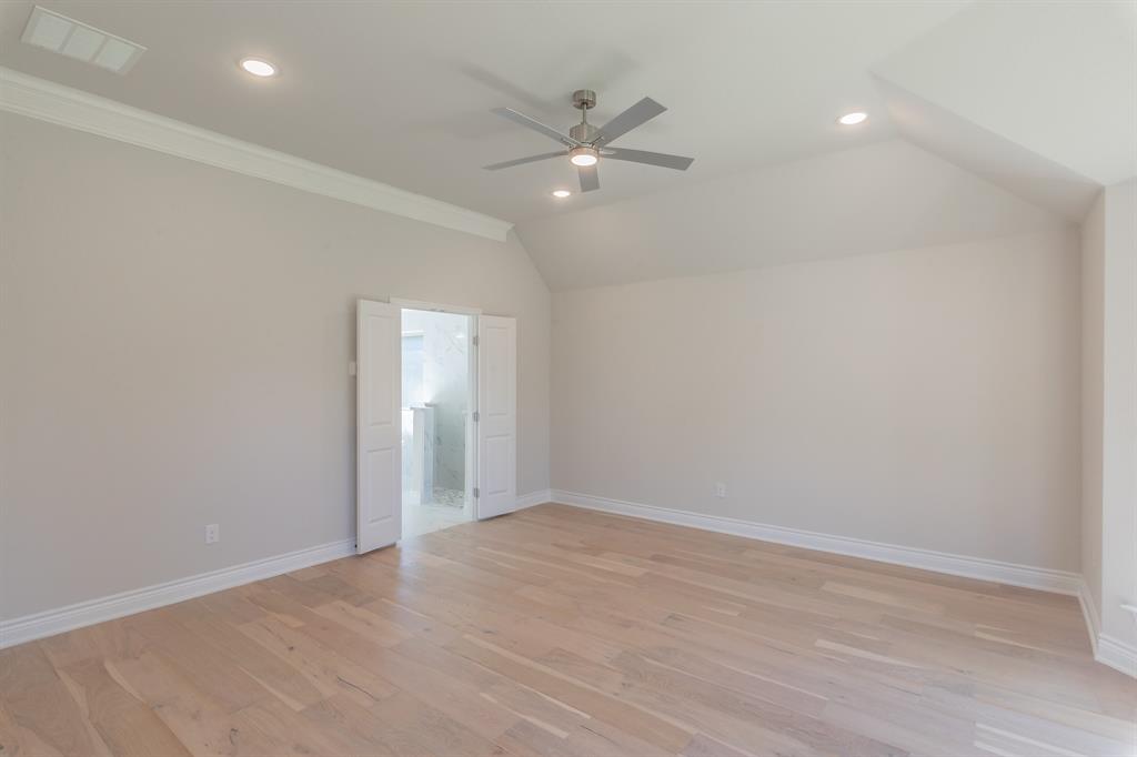 609 Keel Way Azle, TX 76020 - Photo 22 of 32 wooden floor in an empty room with a window