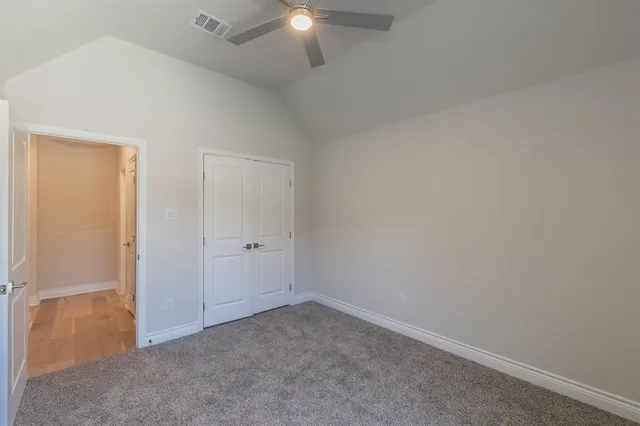 a bathroom with a sink toilet and mirror