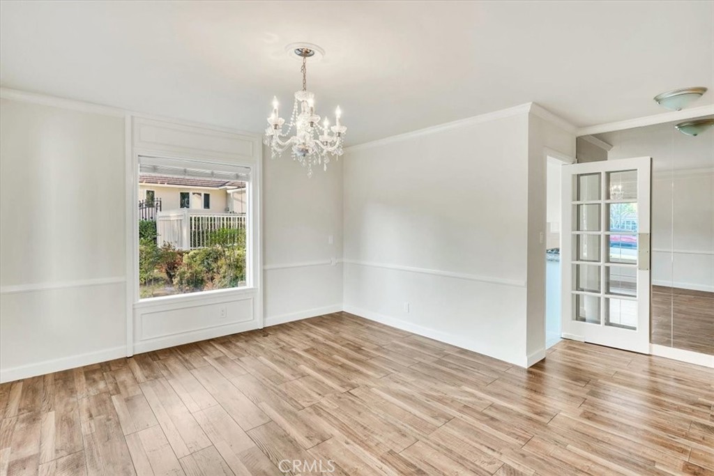 2355 Montecito Drive San Marino, CA 91108 - Photo 29 of 47 wooden floor in an empty room with a window