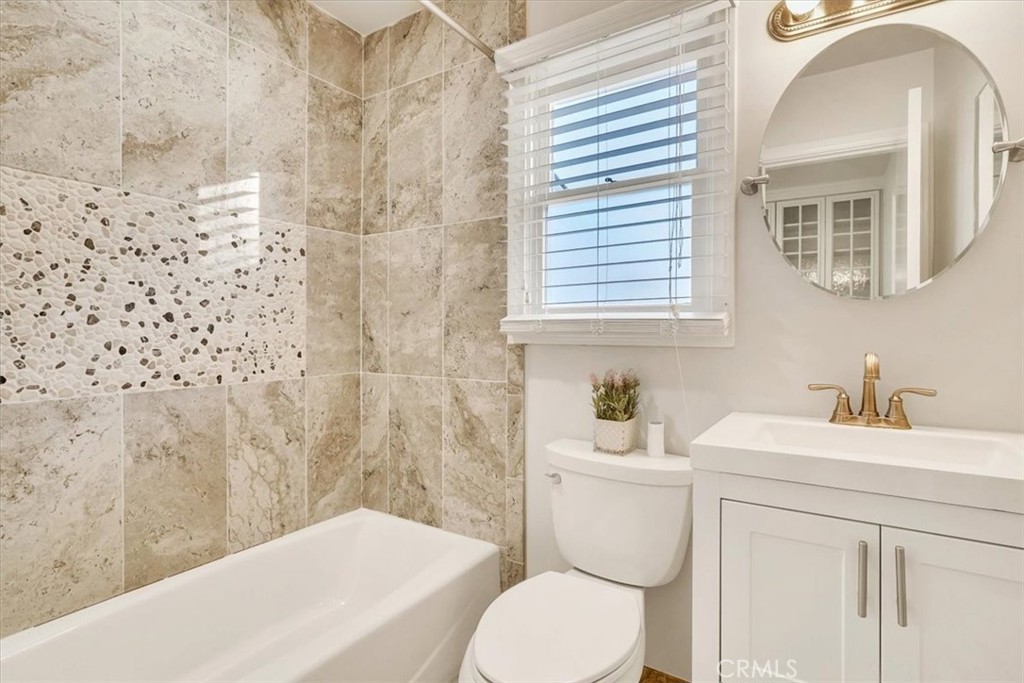 2355 Montecito Drive San Marino, CA 91108 - Photo 30 of 47 a bathroom with a sink toilet and shower