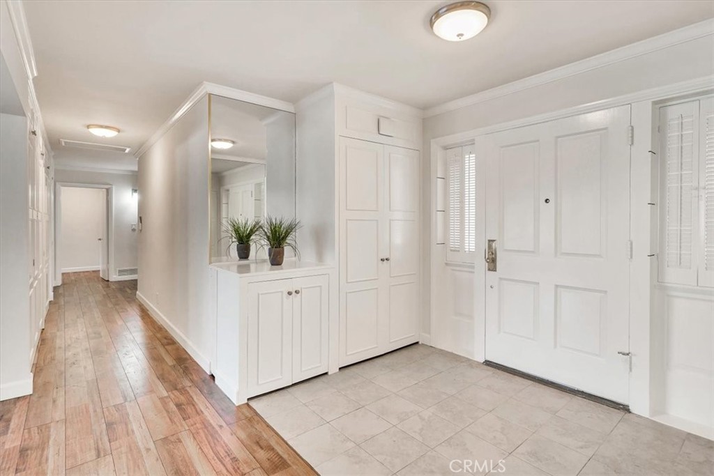2355 Montecito Drive San Marino, CA 91108 - Photo 3 of 47 a view of a hallway with wooden floor