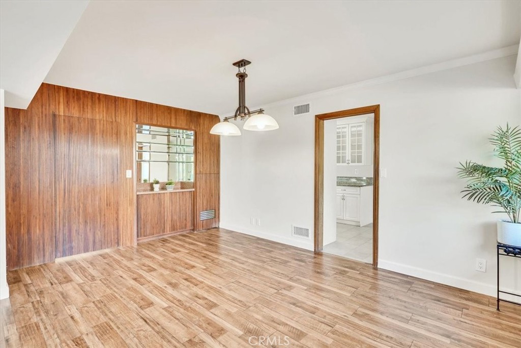 2355 Montecito Drive San Marino, CA 91108 - Photo 36 of 47 a bedroom with a bed and a chandelier