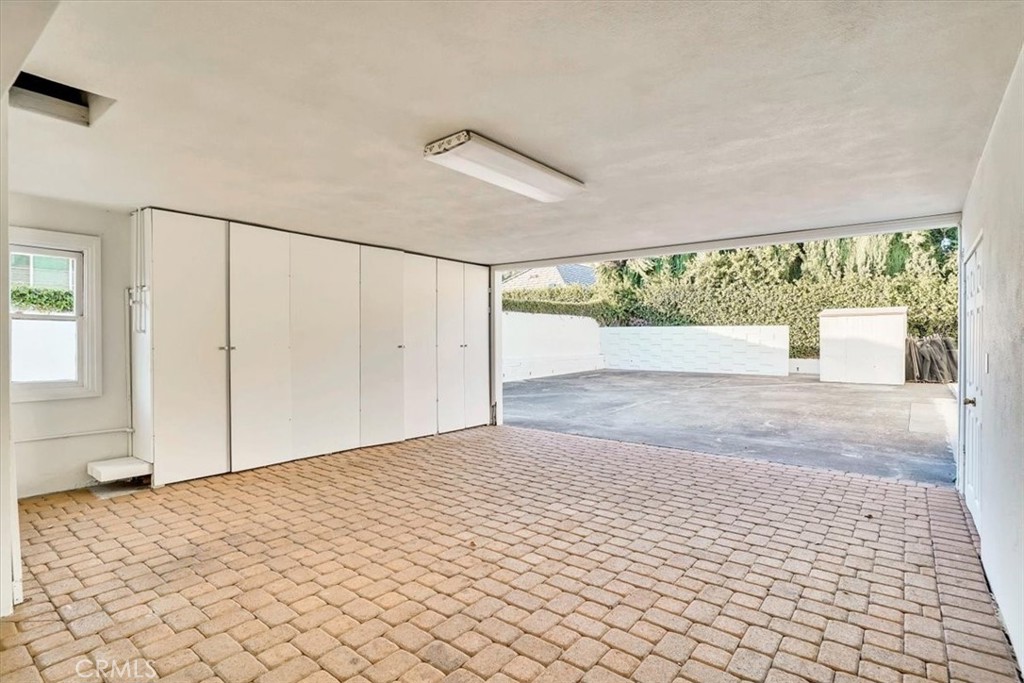 2355 Montecito Drive San Marino, CA 91108 - Photo 37 of 47 a view of empty room with wooden floor and fan