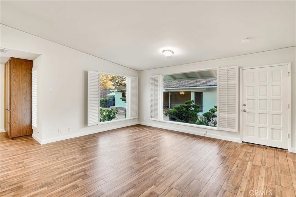 2355 Montecito Drive San Marino, CA 91108 - Photo 42 of 47 a view of an empty room with wooden floor and a window
