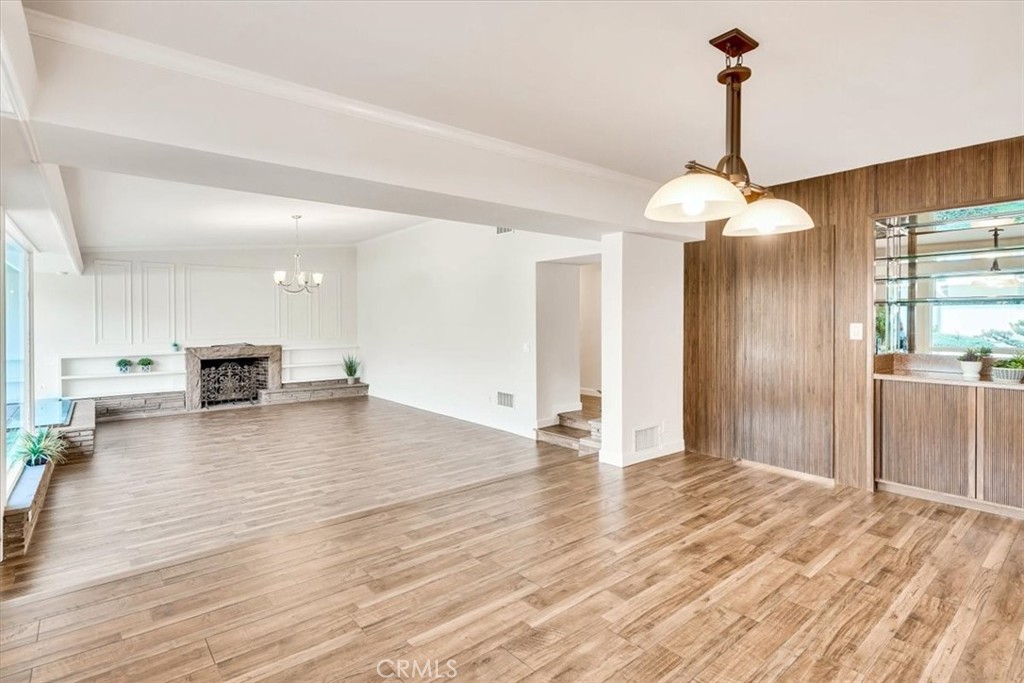 2355 Montecito Drive San Marino, CA 91108 - Photo 10 of 47 a view of a livingroom with a furniture wooden floor and a chandelier