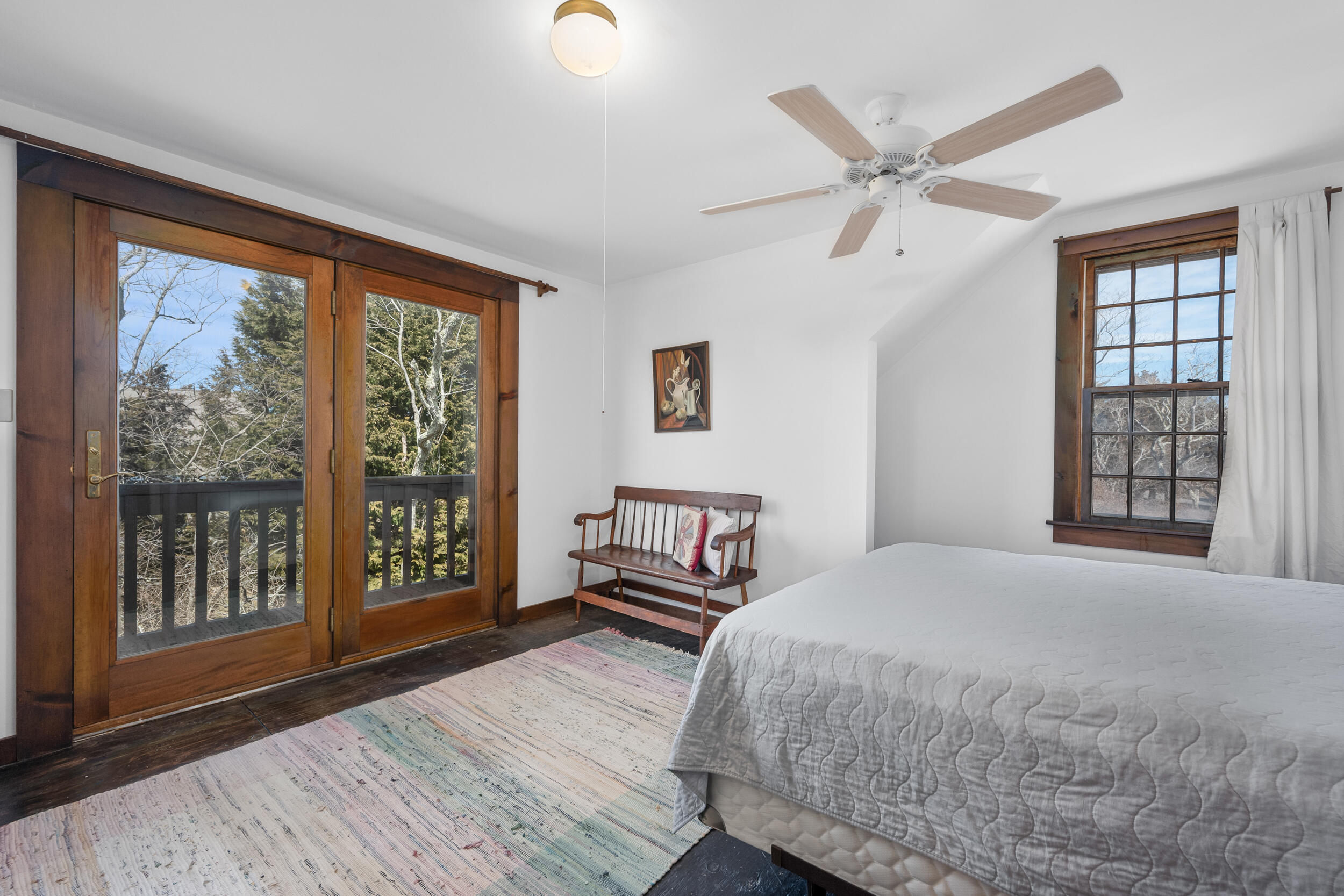 80 Dyer Prince Road Eastham, MA 02642 - Photo 25 of 39 a bedroom with a large bed and a window