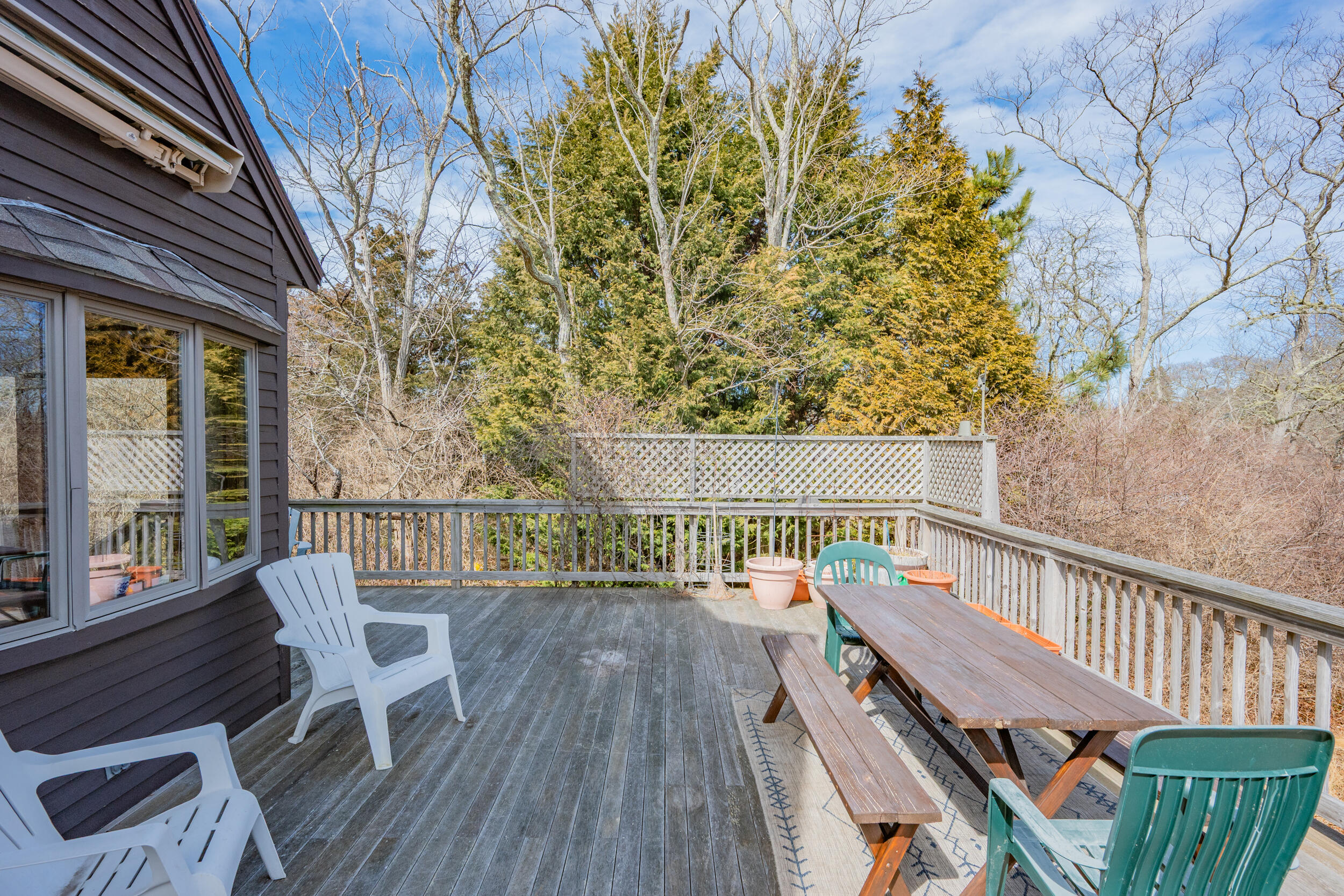 80 Dyer Prince Road Eastham, MA 02642 - Photo 29 of 39 a view of balcony with wooden floor and outdoor seating