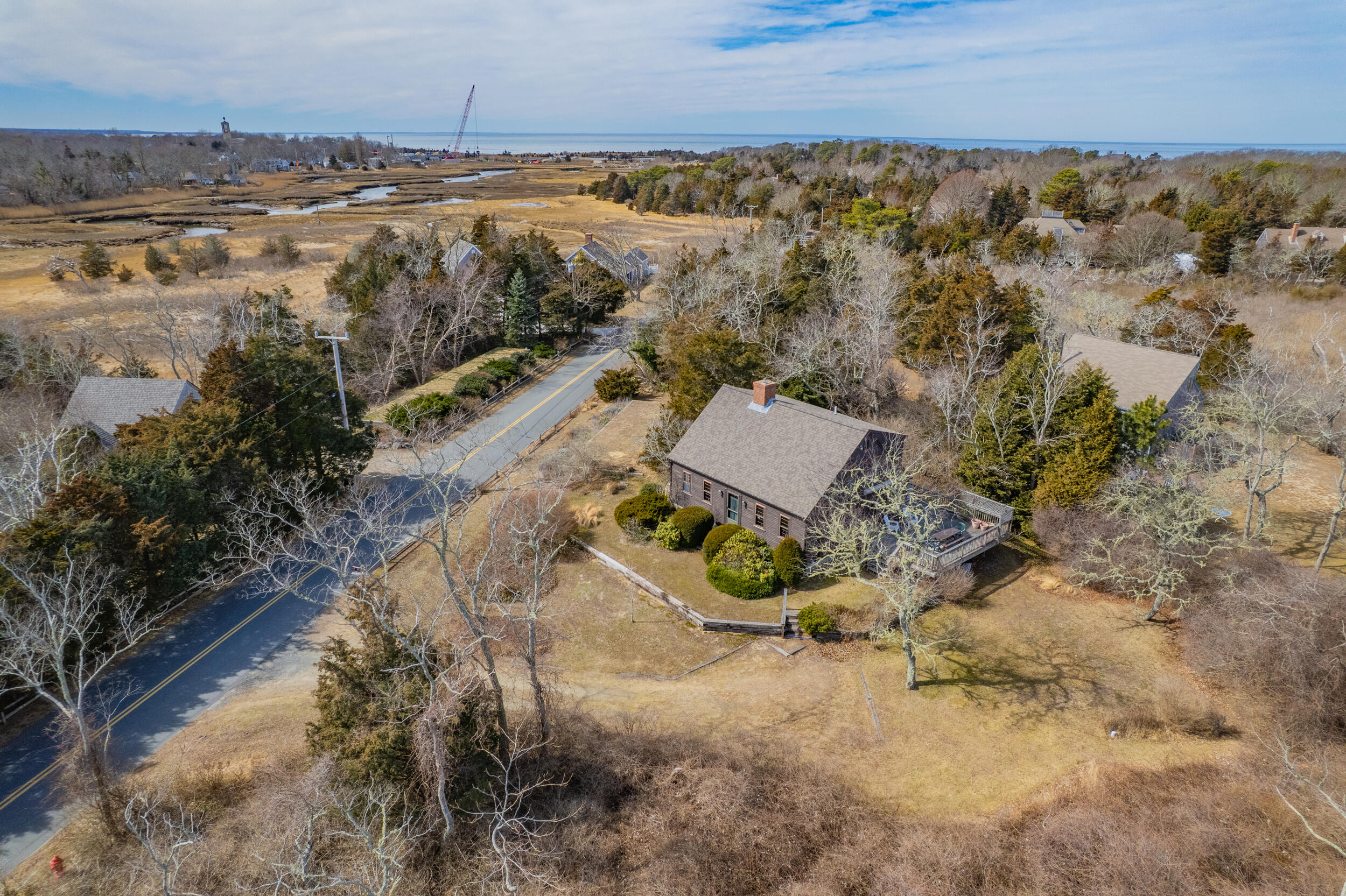 80 Dyer Prince Road Eastham, MA 02642 - Photo 4 of 39 an aerial view of a house with a yard