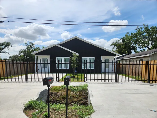 a house view with a garden space