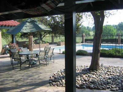10580 Millerton Road Clovis, CA 93619 - Photo 25 of 45 View of Pool and Courtyard from Study/Den, looking toward Northeast Pasture.