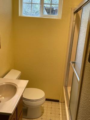 9813 Prunedale South Road Salinas, CA 93907 - Photo 17 of 18 a white toilet sitting next to a sink