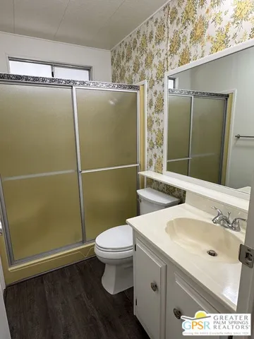 a view of a kitchen with electric appliances